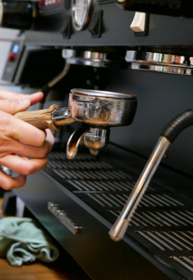 closeup of a commercial being used by a barista
